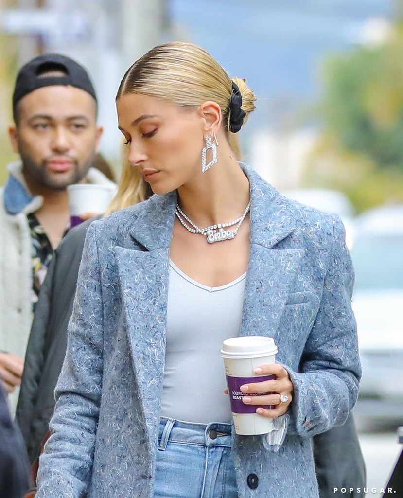 Hailey Baldwin Wearing Her Bieber Necklace With a Blue Coat
