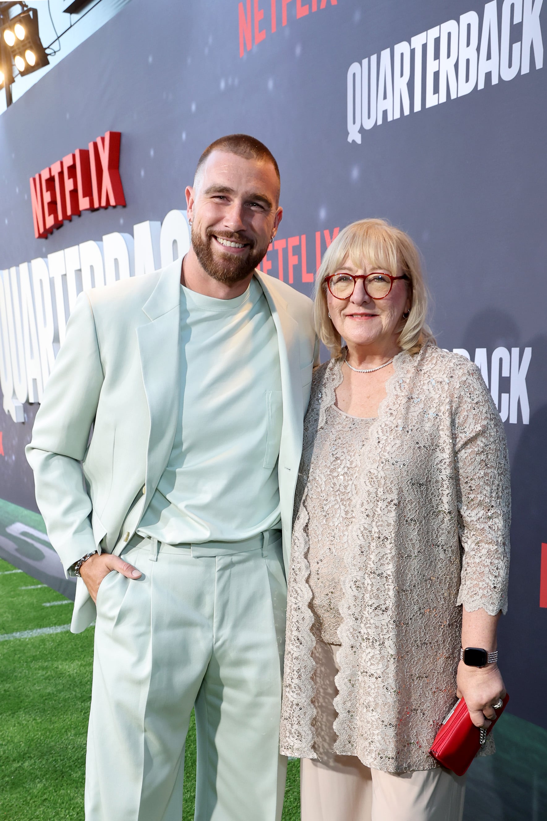 Travis Kelce's Mom Donna Dons Silver Sandals for Quarterback Premiere –  Footwear News