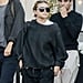 Ashley Olsen Wearing Black Trousers and Slides to the Movies