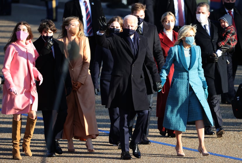 WASHINGTON, DC - JANUARY 20:  U.S. President Joe Biden and First Lady Dr. Jill Biden and family walk the abbreviated parade route after Biden's inauguration on January 20, 2021 in Washington, DC.  Biden became the 46th president of the United States earli