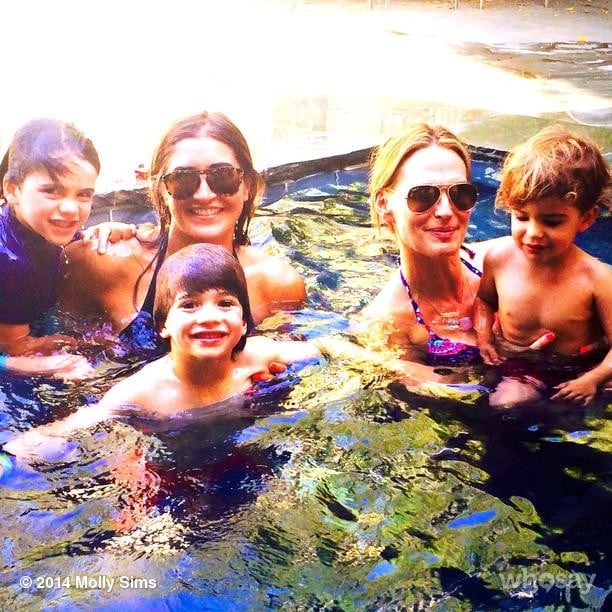 Hot temperatures gave Brooks Stuber and Molly Sims an excuse to hop in the pool. 
Source: Instagram user mollybsims