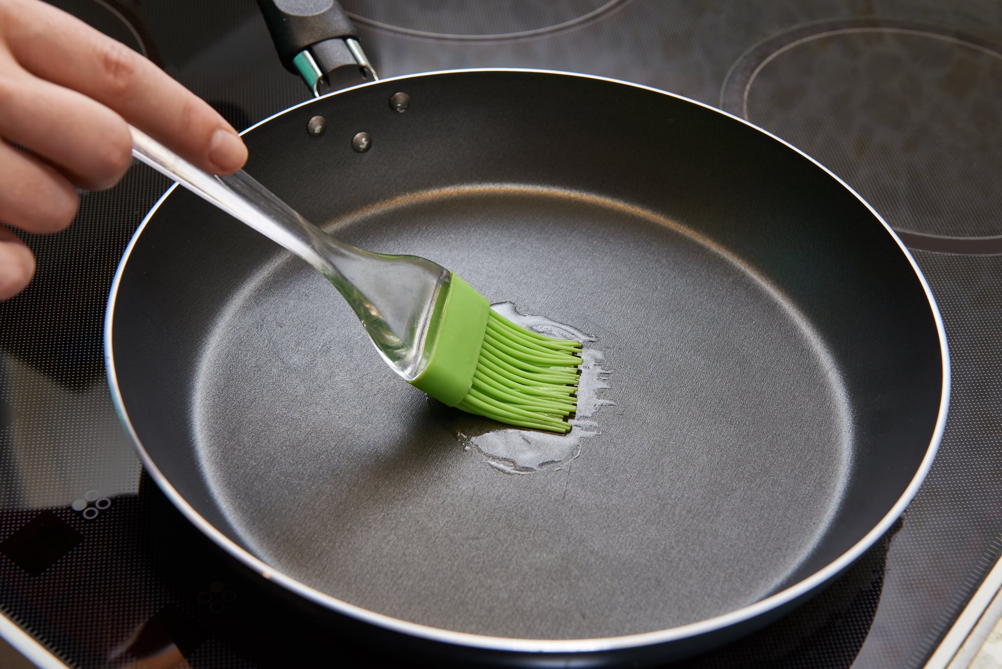 Brush with sunflower oil in a frying pan