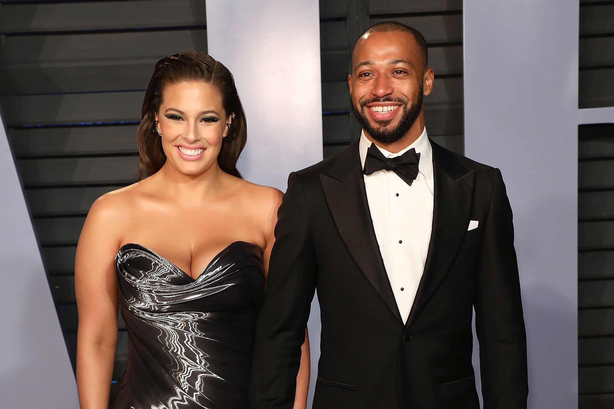 BEVERLY HILLS, CA - MARCH 04:  Justin Ervin and Ashley Graham attend the 2018 Vanity Fair Oscar Party hosted by Radhika Jones at the Wallis Annenberg Centre for the Performing Arts on March 4, 2018 in Beverly Hills, California.  (Photo by Taylor Hill/FilmMagic)