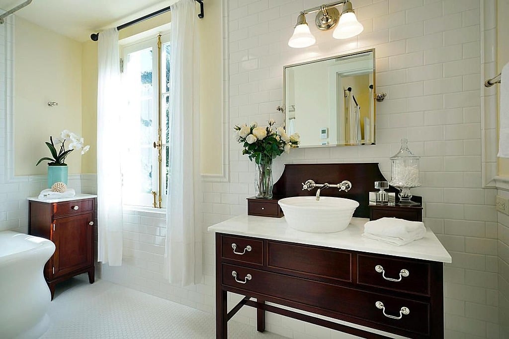 The home contains four beautifully appointed full baths and five half baths.