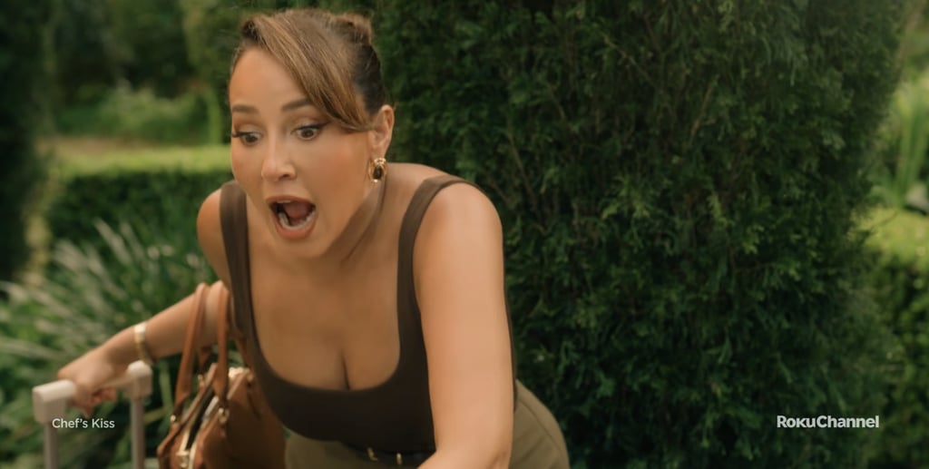 In the first scene of the trailer, Lauren (Adrienne Bailon-Houghton) is seen wearing a fitted scoop-neck tank paired with tailored trousers that set the tone for her character immediately: she's unfussy, confident, and quietly chic. It's the kind of look that proves simplicity — when done well — still makes the strongest statement.
Shop the look: Bodywear by Victoria's Secret Square-Neck Tank Bodysuit ($20, originally $45), The Perfect Hoop Hazel Earring ($32)