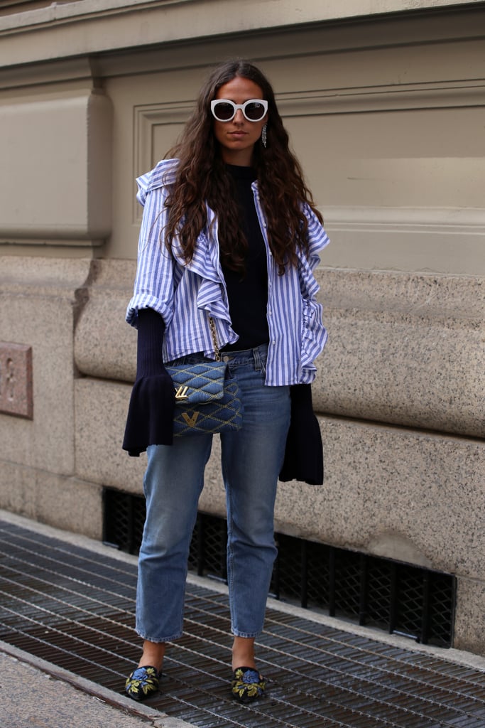 Layer Your Favorite Ruffled Top Over a Sweater For Something Unexpected