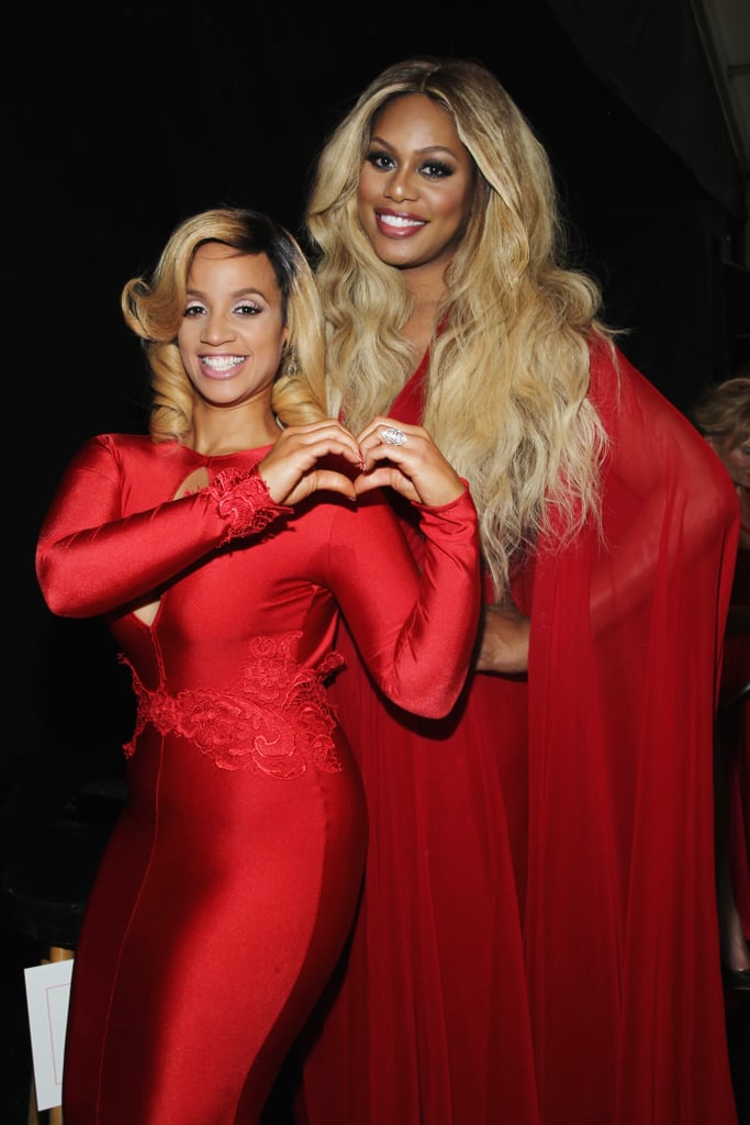 Orange Is the New Black stars Laverne Cox and Dascha Polanco posed backstage before walking the runway at the Go Red For Women Red Dress Collection show.