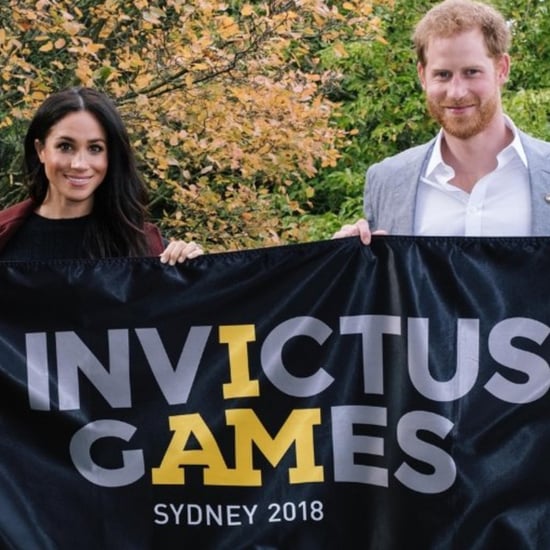 Prince Harry and Meghan Markle Holding the Invictus Flag