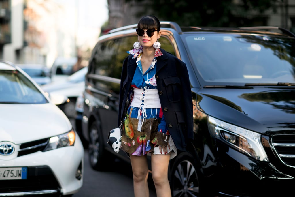 . . . While this show-goer added hers to a printed look, also at MFW.