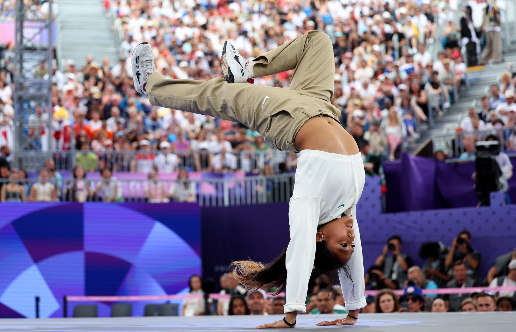 PARIS, FRANCE - AUGUST 09: B-Girl Logistx of Team United States competes during the B-Girls Round Robin - Group B on day fourteen of the Olympic Games Paris 2024 at Place de la Concorde on August 09, 2024 in Paris, France. (Photo by Elsa/Getty Images)