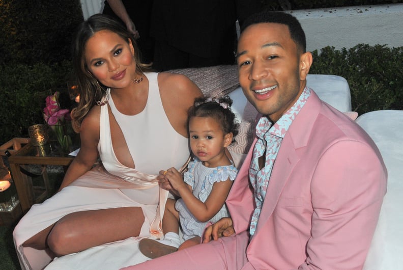 BEVERLY HILLS, CA - JUNE 21:  (L-R) Chrissy Teigen, Luna Simone Stephens and John Legend attend John Legend's launch of his new rose wine brand, LVE, during an intimate Airbnb Concert on June 21, 2018 in Beverly Hills, California.  (Photo by Jerod Harris/