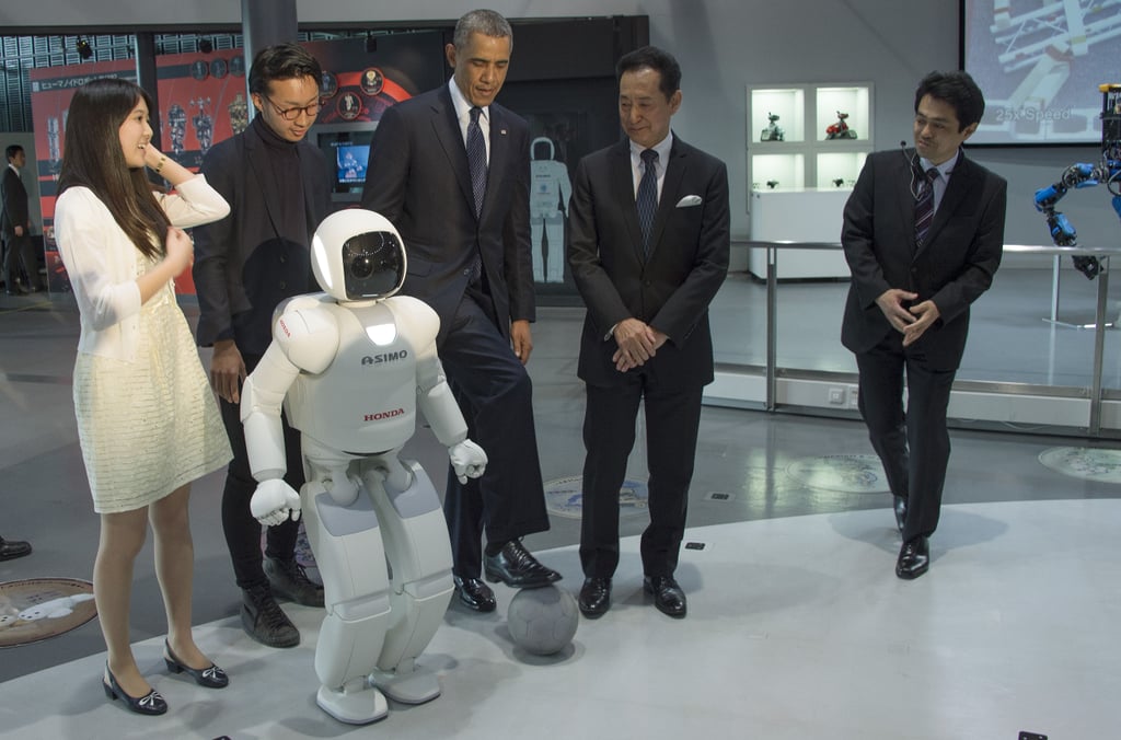 Testing out a robot's skills while visiting Japan in 2014.
