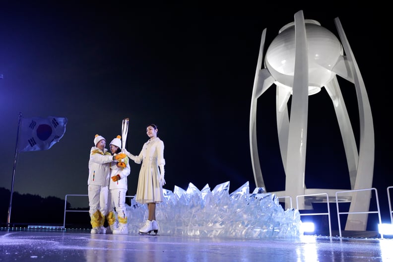 The torch was handed off to South Korean figure skater Yuna Kim.