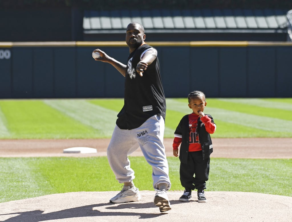 Kanye West and Saint West Throw First Pitch at Baseball Game