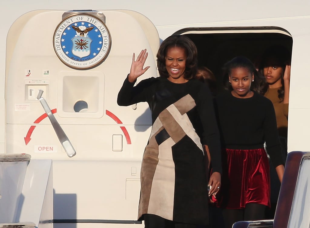 First Lady Michelle Obama gave a wave when the group arrived in China.