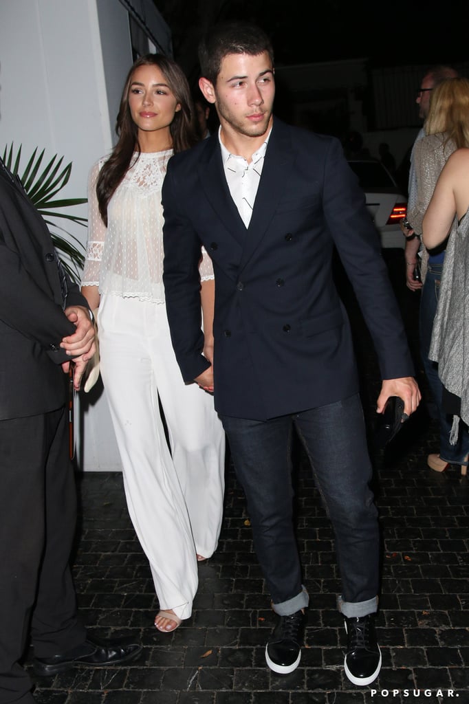 On Saturday, Nick Jonas guided the way for his girlfriend Olivia Culpo after attending his mom's birthday celebration at the Chateau Marmont in LA.