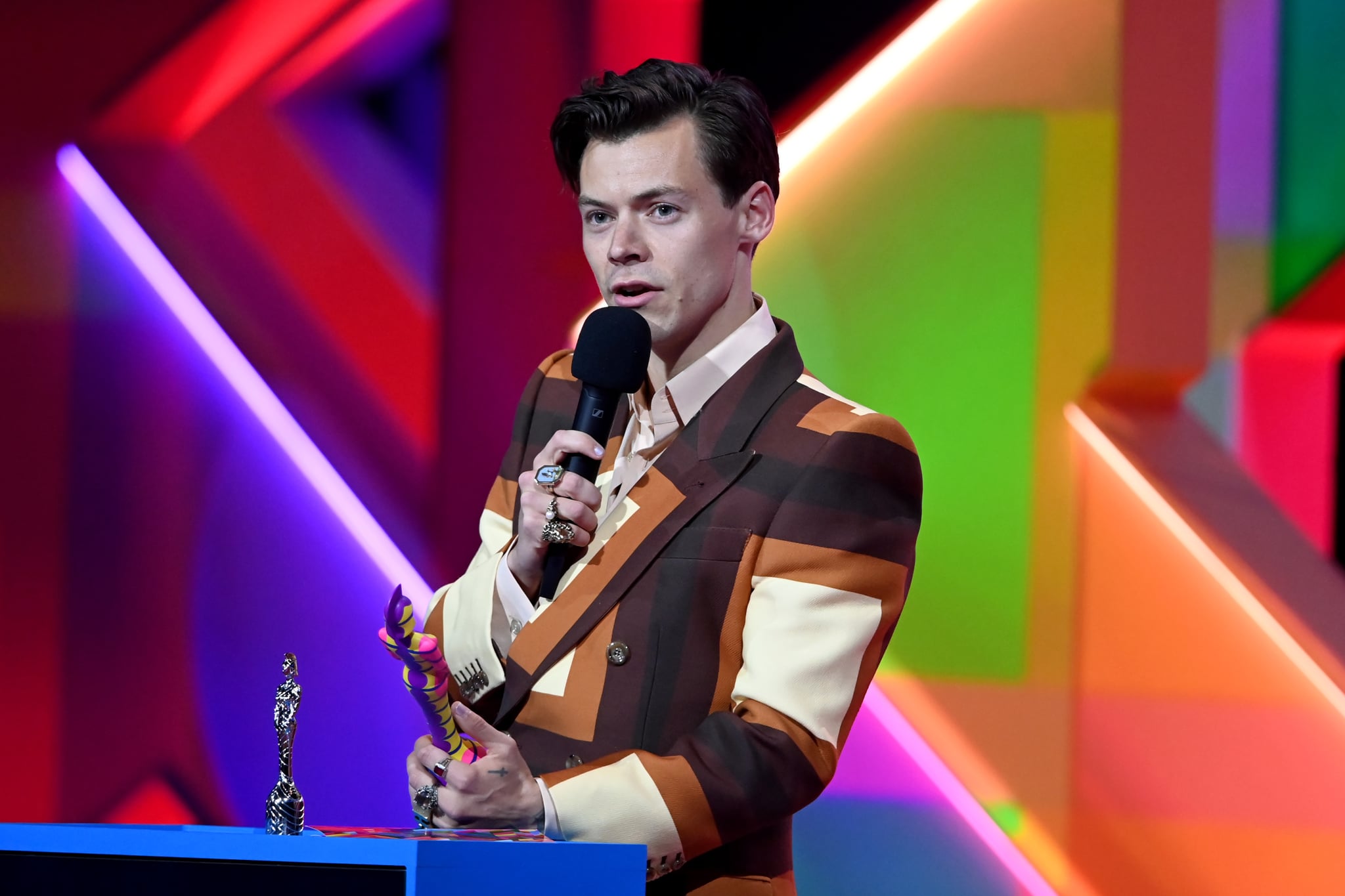 LONDON, ENGLAND - MAY 11: Harry Styles accepts his award for British Single during The BRIT Awards 2021 at The O2 Arena on May 11, 2021 in London, England. (Photo by Dave J Hogan/Getty Images)