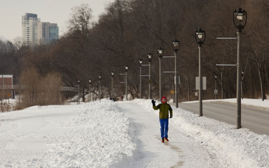 A dedicated runner braved the chilly weather for a jog through Milwaukee.