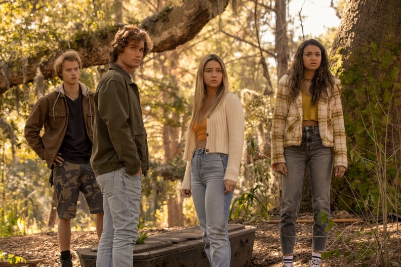 OUTER BANKS (L to R) RUDY PANKOW as JJ, CHASE STOKES as JOHN B, MADELYN CLINE as SARAH CAMERON, and MADISON BAILEY as KIARA in episode 208 of OUTER BANKS Cr. JACKSON LEE DAVIS/NETFLIX  2021