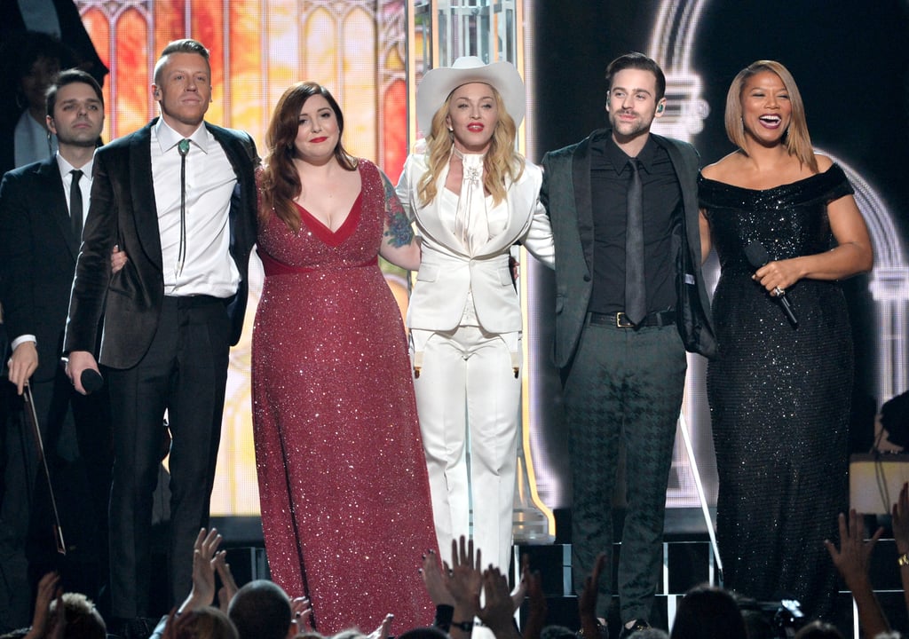 Macklemore & Ryan Lewis performed with Madonna and Mary Lambert at the Grammys. They were joined by Queen Latifah, who officiated a mass wedding during their song.