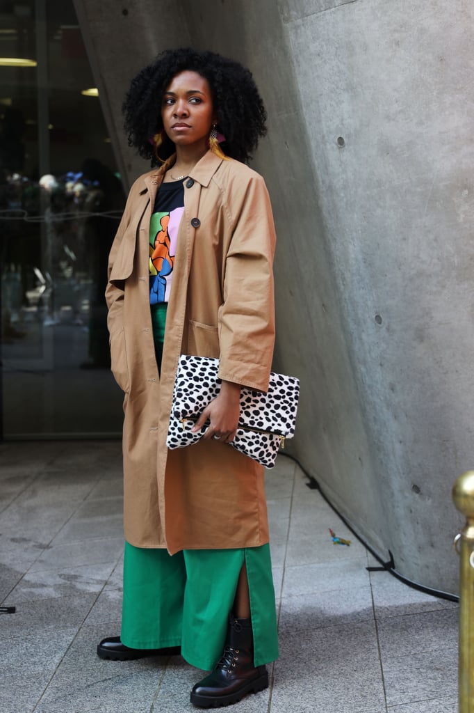 Layer a black tee with vibrant pants and a trench coat that's easy to ...