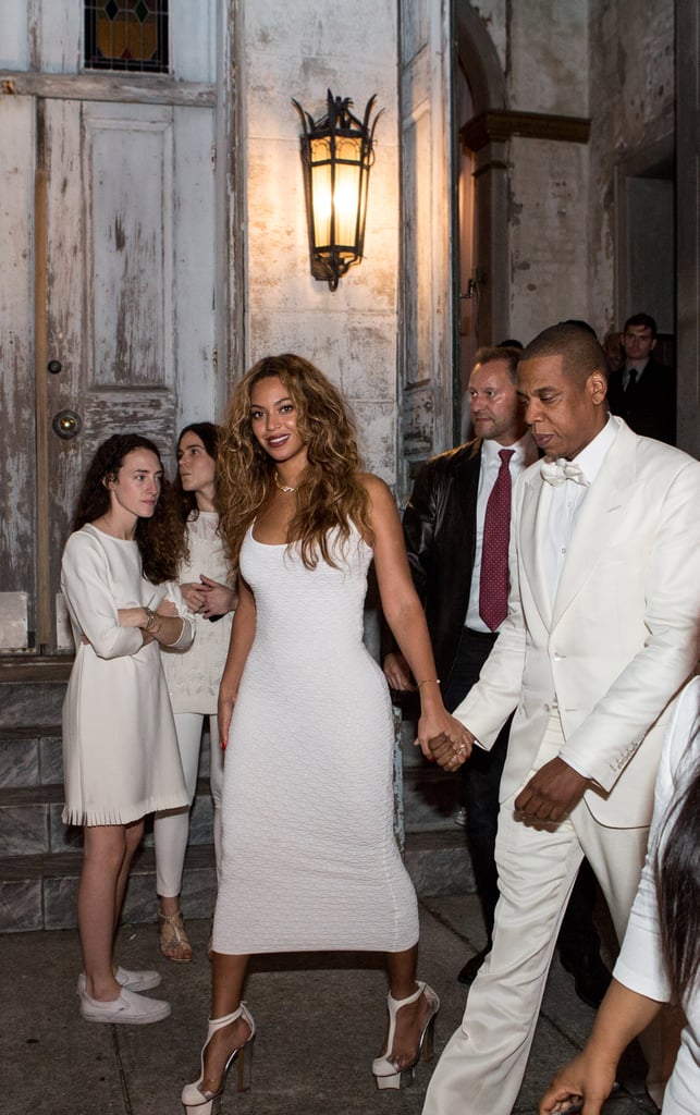 In November 2014, Solange Knowles celebrated her wedding and Beyoncé and JAY-Z got the memo in ivory outfits outside of the Marigny Opera House in New Orleans, LA.