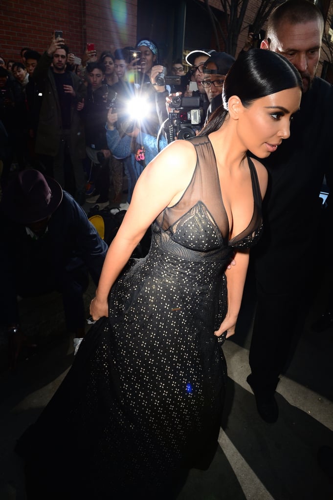 Man Stepping on Kim Kardashian's Dress