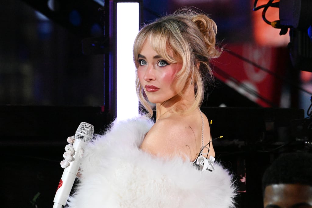 Sabrina Carpenter's "At Last" Back Tattoo