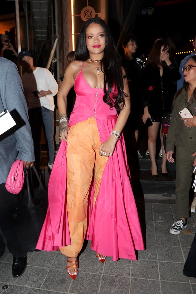 Rihanna Wearing a Pink Dress and Orange Pants in Seoul