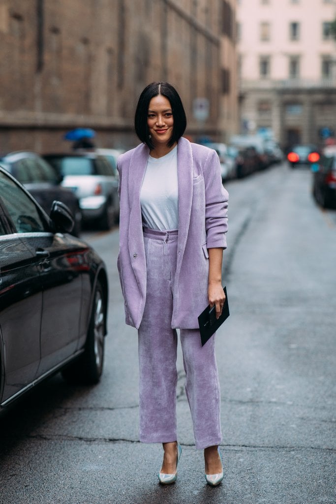 Tiffany Hsu makes a masculine pantsuit feminine by opting for a lavender suit.