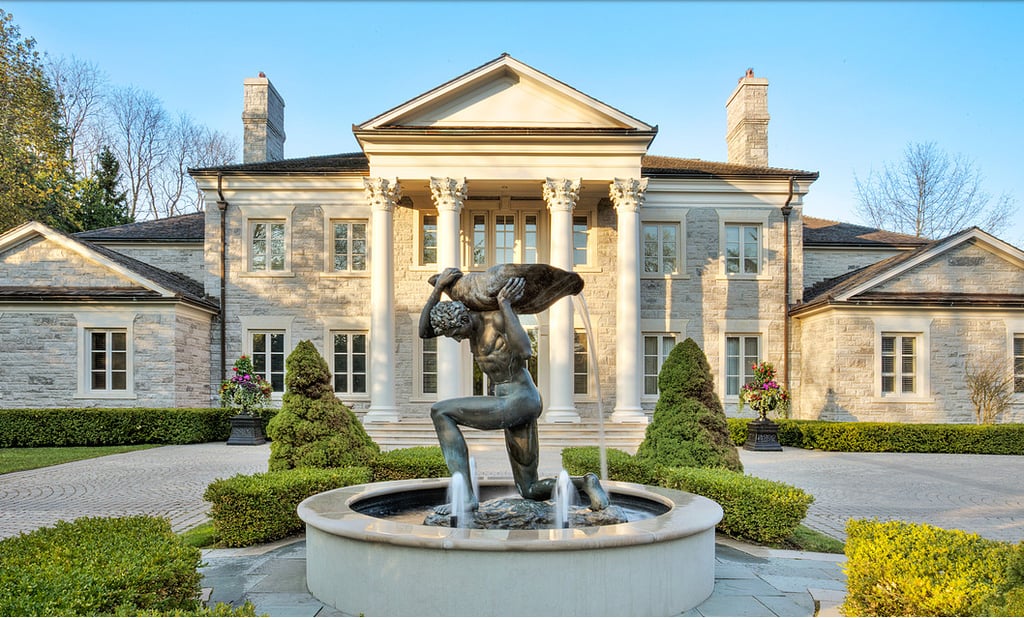 Pull around the driveway in your Lexus convertible, and the first thing you'll see is a theatrical water fountain.
