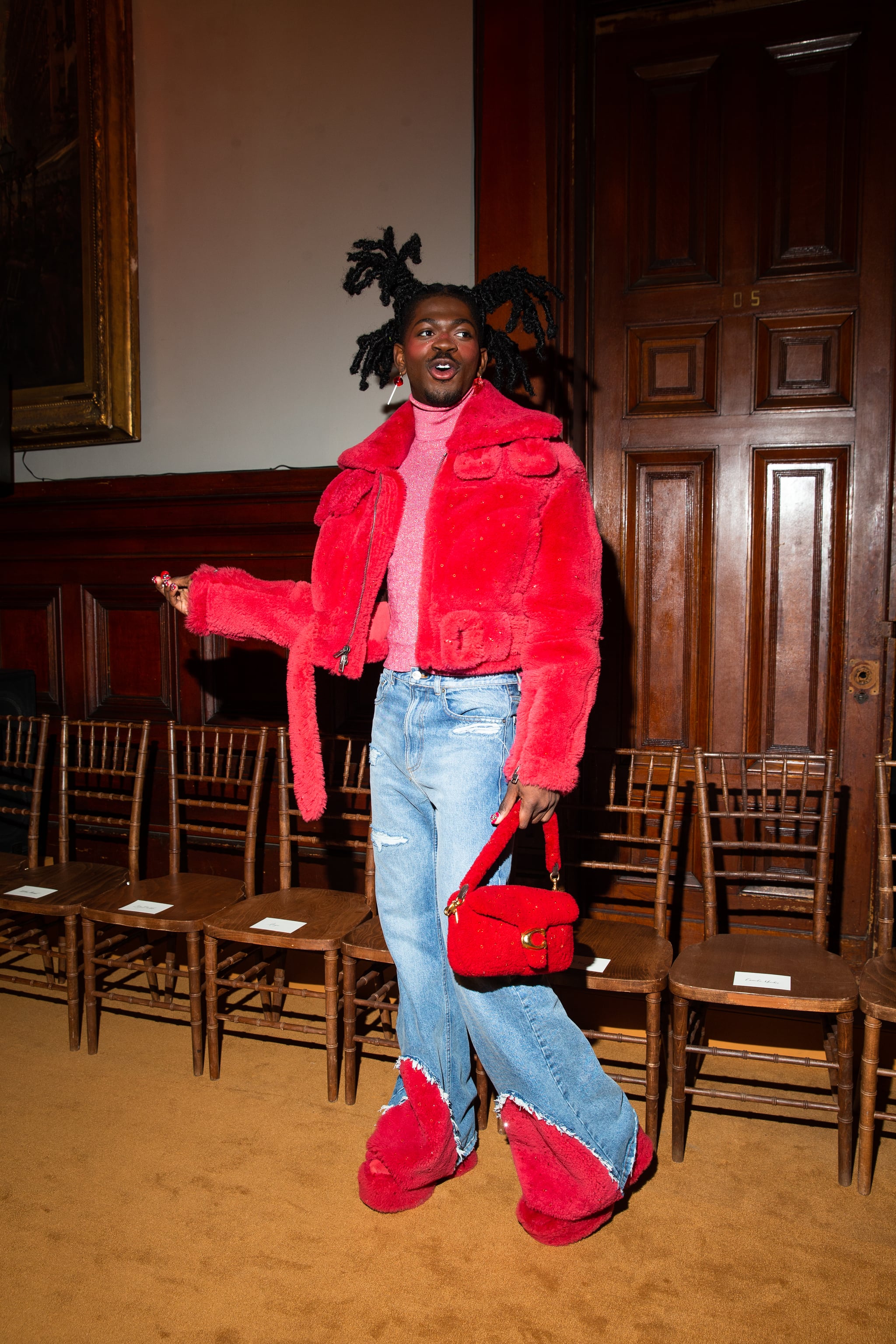 Lil Nas X in the front row at Coach Fall 2023 Ready To Wear Fashion Show at Park Avenue Armory on February 13, 2023 in New York, New York. (Photo by Lexie Moreland/WWD via Getty Images)