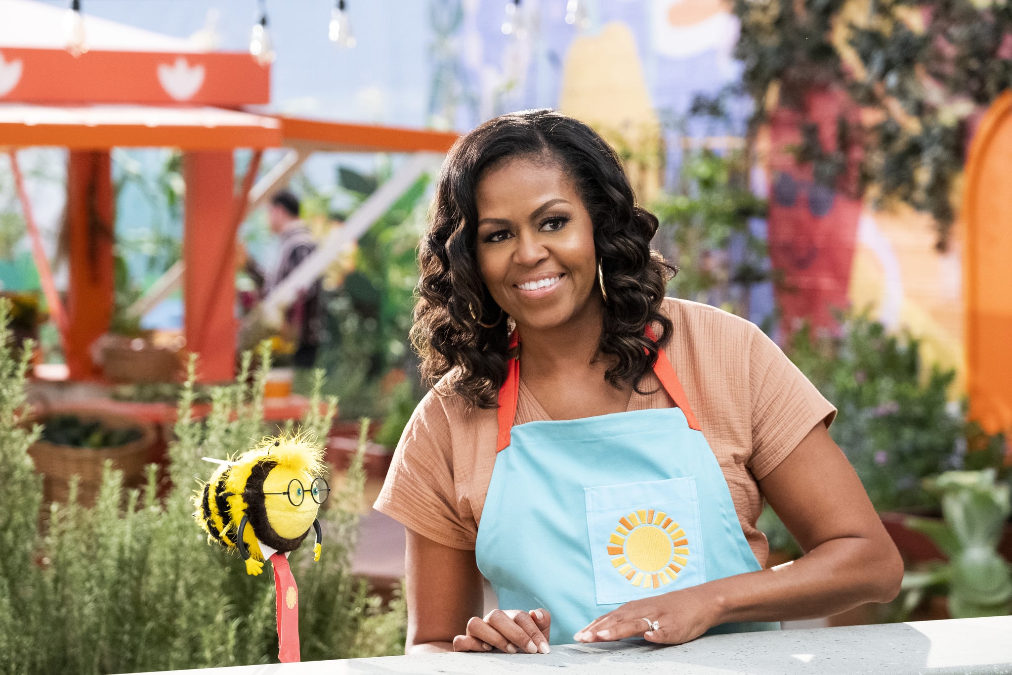 WAFFLES + MOCHI (L to R) BUSY and MICHELLE OBAMA in episode 110 of WAFFLES + MOCHI Cr. ADAM ROSE/NETFLIX  2020