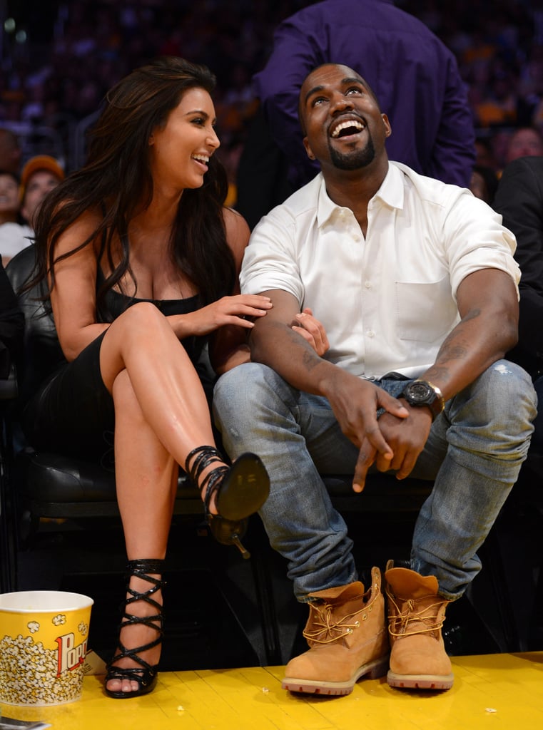 Kim Kardashian and Kanye West looked stylish while sitting courtside at the May 2012 playoff game between the LA Lakers and the Denver Nuggets.
