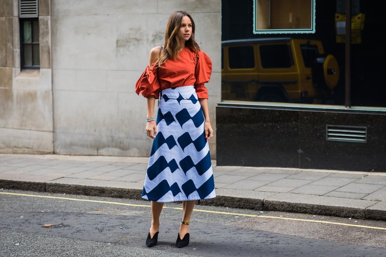 In a Rusty Shade of Orange With a Longer Skirt and Mules