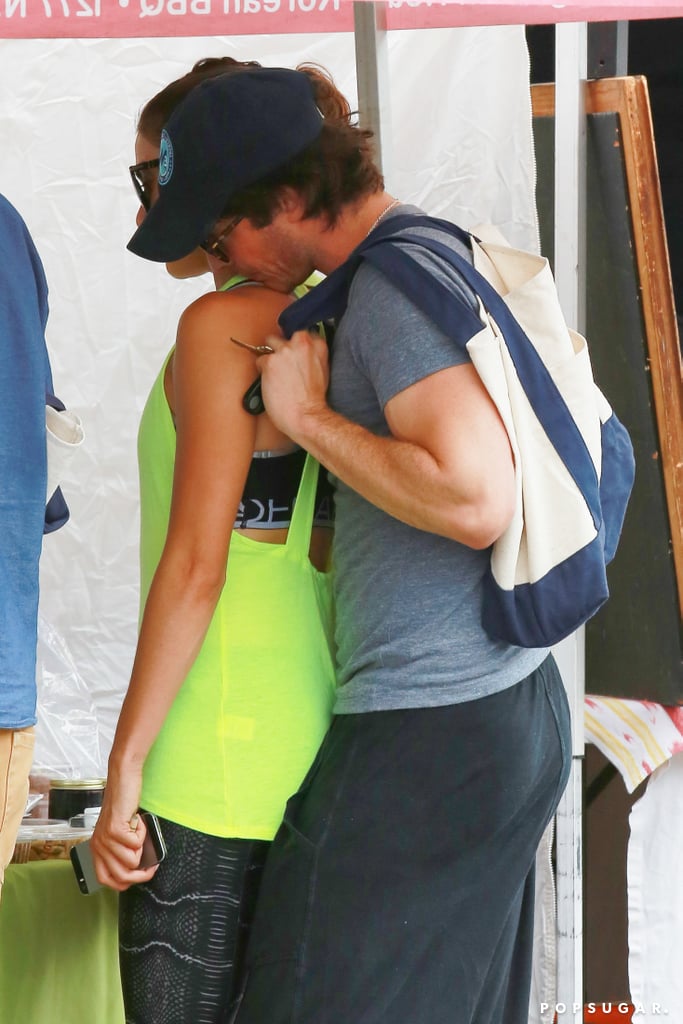 Ian rested his chin on Nikki's shoulder.