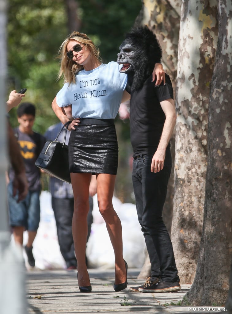 Heidi Klum Posing With a Man in a Gorilla Mask