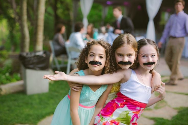 These pint-size wedding guests mustache you a question.