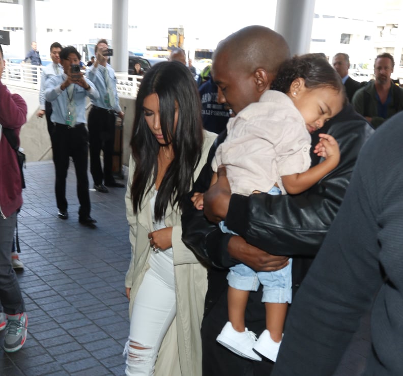 North cozied up in a cute but casual outfit that included jeans and sneakers.