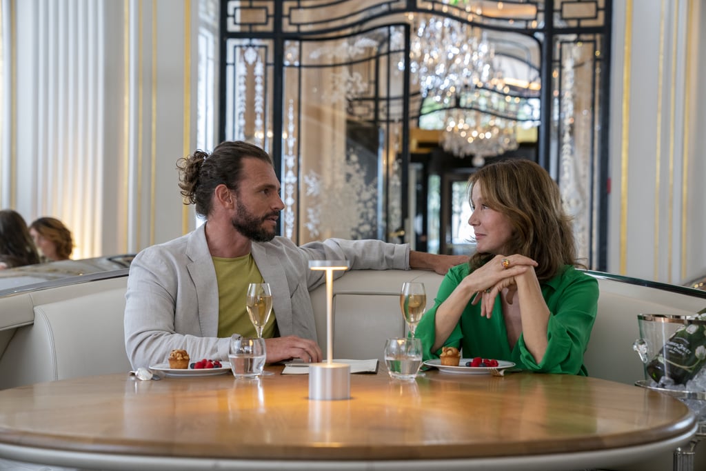 Sylvie Wearing an Emerald Blouse in "Emily in Paris" Season 2