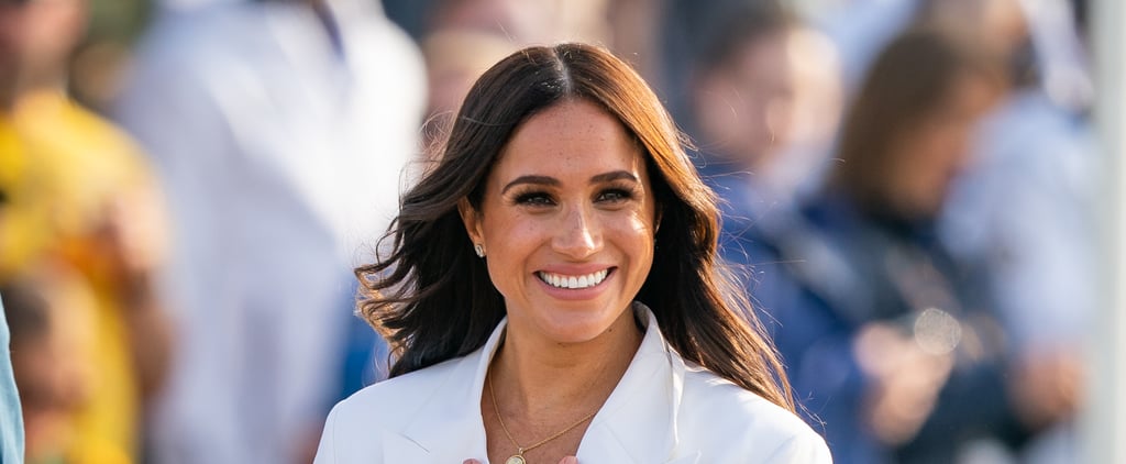 Meghan Markle Gives Her Coat to Mom at Invictus Games