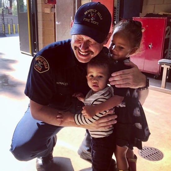 Chrissy Teigen Son Miles Stephens Meets a Firefighter Photo