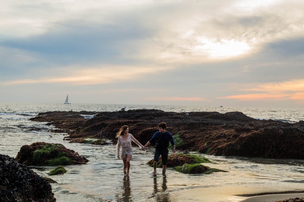 This Couple Totally Reminds Us of a Modern Ariel and Eric in Their Beach Engagement Shoot This Couple Totally Reminds Us of a Modern Ariel and Eric in Their Beach Engagement Shoot