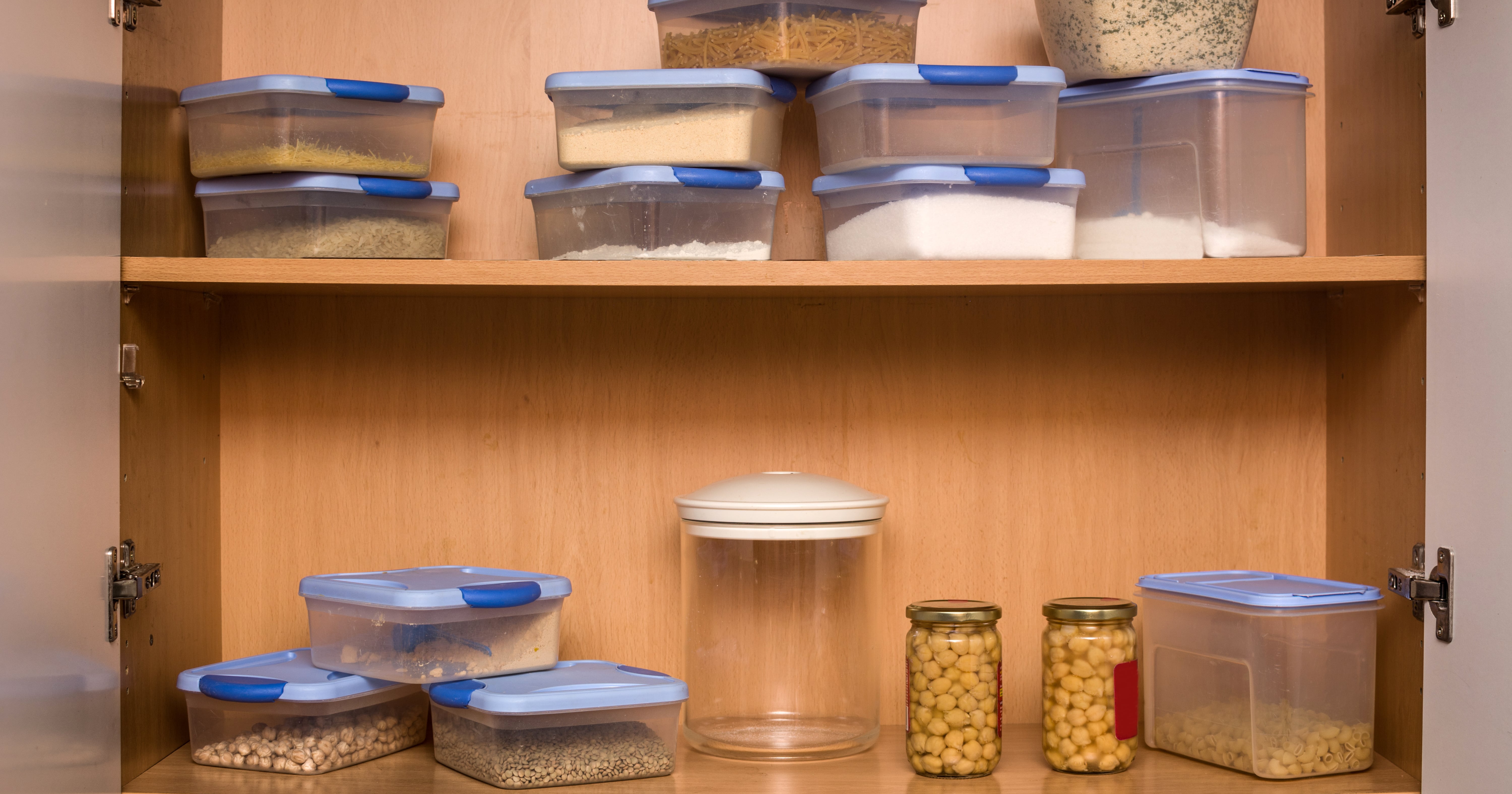 7 Tricks for Taming Your Cabinet of Food Storage Containers  Kitchen hacks  organization, Home organization, Tupperware organizing