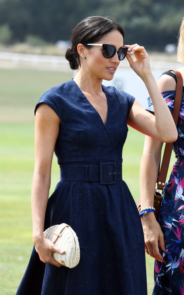 Another cat-eye style, the sunglasses feature gold arms with the designer's T initial.