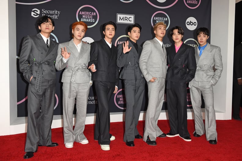 LOS ANGELES, CALIFORNIA - NOVEMBER 21: (L-R) V, Suga, Jin, Jungkook, RM, Jimin, and J-Hope of BTS attend the 2021 American Music Awards at Microsoft Theater on November 21, 2021 in Los Angeles, California. (Photo by Axelle/Bauer-Griffin/FilmMagic)