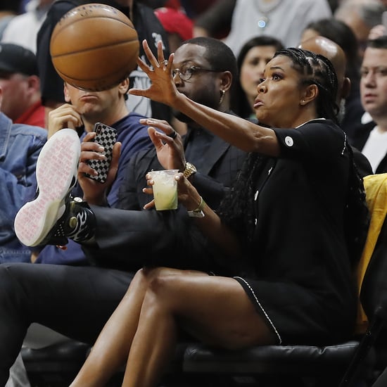 Gabrielle Union and Dwyane Wade Dodge Basketball at NBA Game