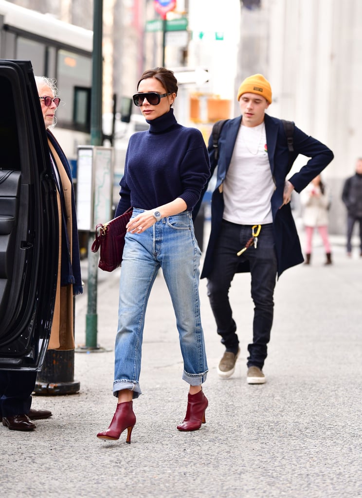 Earlier that month, she accessorised her fairly simple outfit with a pair of burgundy booties.