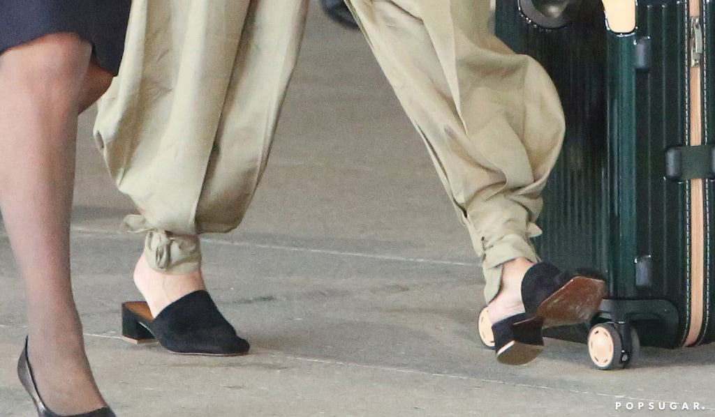 Amal Clooney Black Mules at the Airport 2018