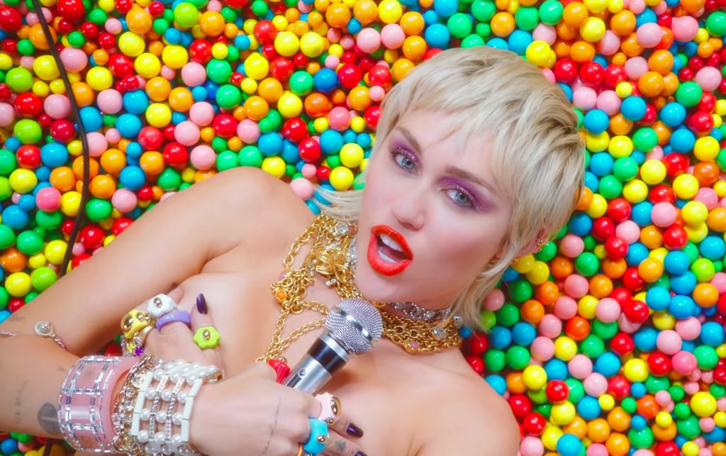 Miley Cyrus Wearing Colorful Jewelry in "Midnight Sky"